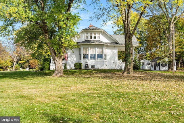 view of front of house with a front yard