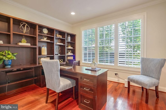 office featuring wood-type flooring, a wealth of natural light, and ornamental molding