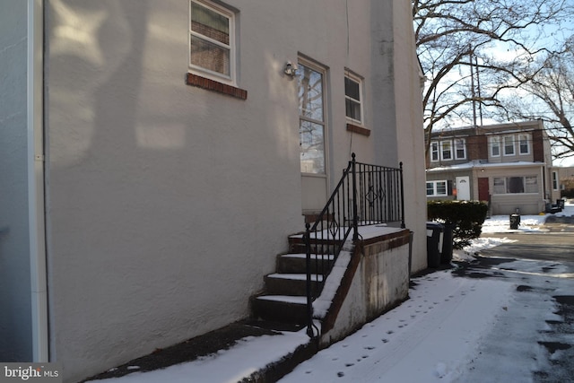 view of snow covered property