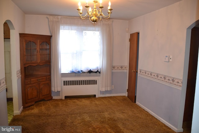 carpeted dining area with radiator and an inviting chandelier