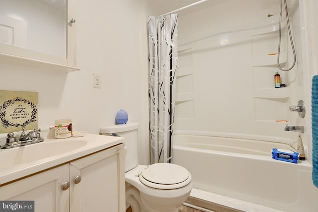 full bathroom featuring vanity, shower / bath combination with curtain, and toilet