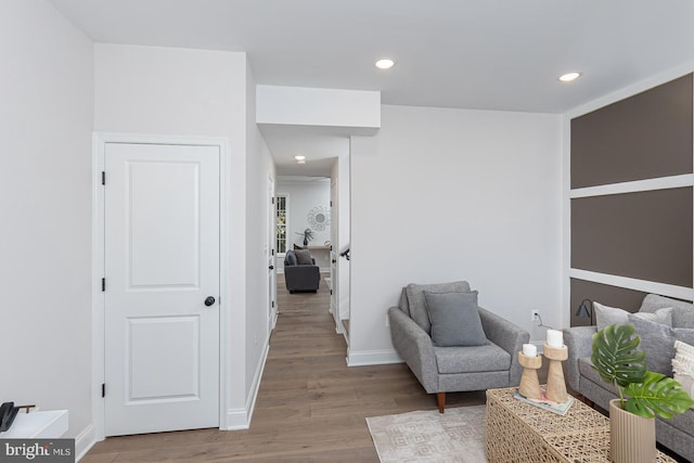 living area with light hardwood / wood-style floors