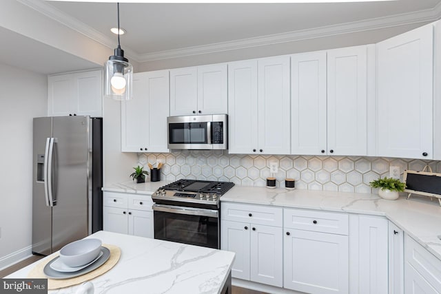 kitchen with light stone countertops, hanging light fixtures, white cabinets, and stainless steel appliances