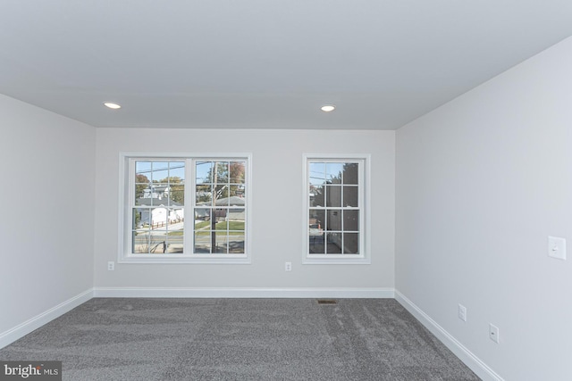 view of carpeted spare room