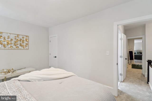 bedroom with light carpet