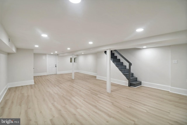 basement featuring light hardwood / wood-style floors