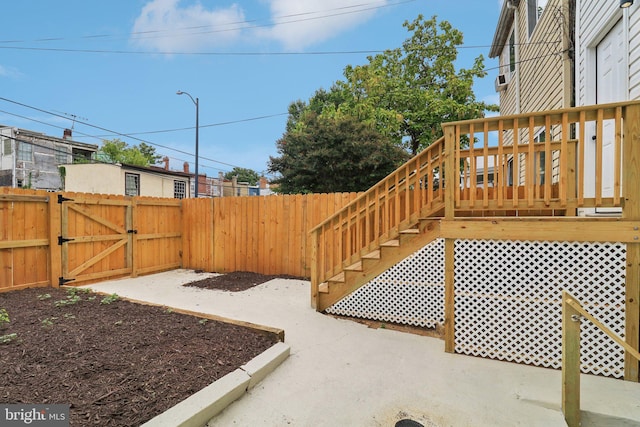 view of yard with a wooden deck