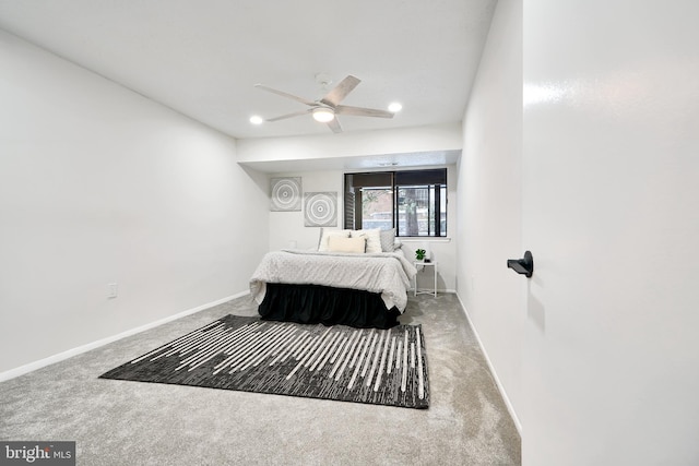 carpeted bedroom with ceiling fan