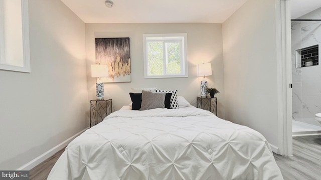 bedroom featuring light wood-type flooring