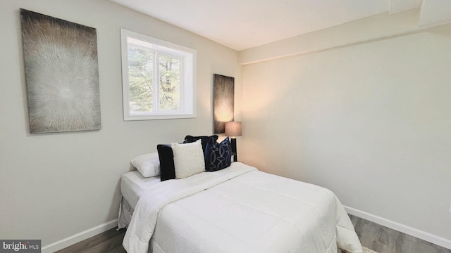 bedroom with wood-type flooring