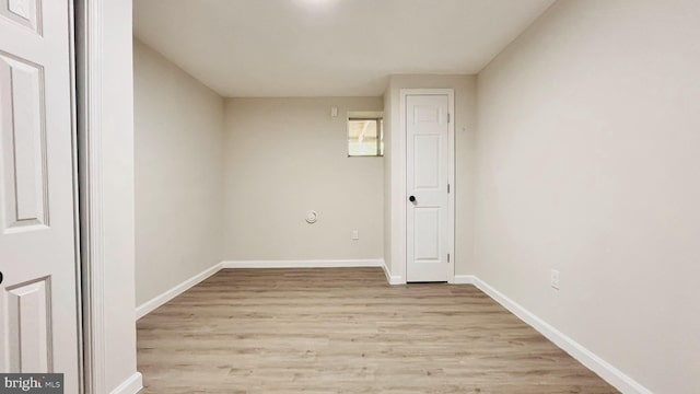 unfurnished room featuring light hardwood / wood-style floors