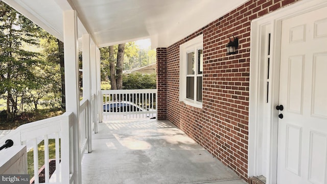 balcony featuring covered porch