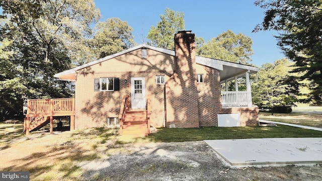 back of house with a patio