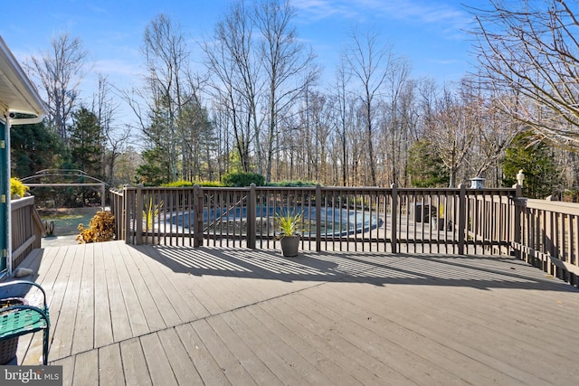 deck with a covered pool