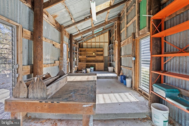 misc room with lofted ceiling