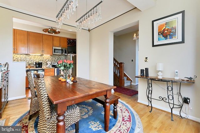 dining space featuring light hardwood / wood-style flooring