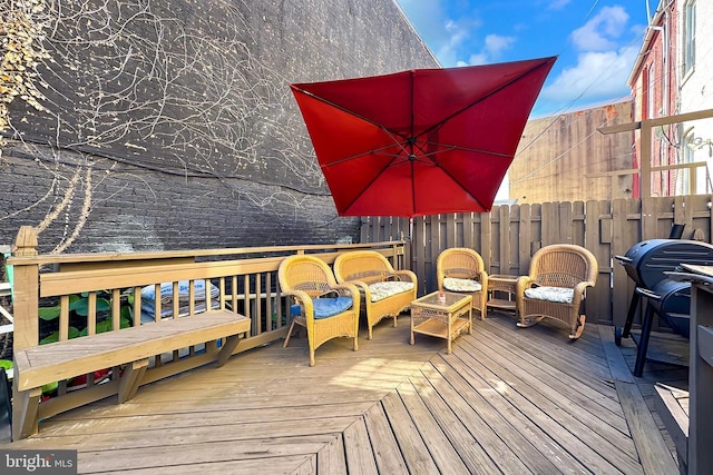 wooden deck featuring outdoor lounge area