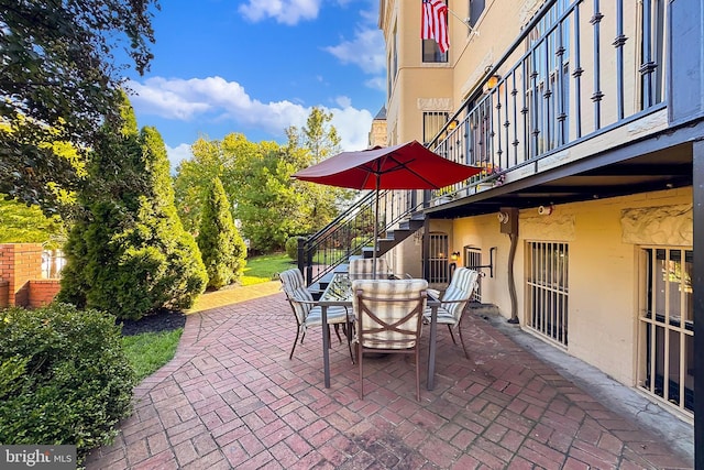 view of patio with a balcony