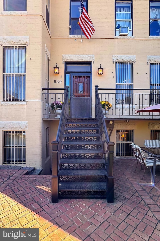 property entrance with a patio