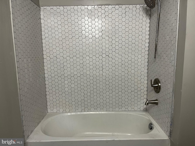 bathroom featuring washtub / shower combination