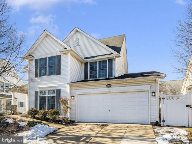 view of front of home with a garage