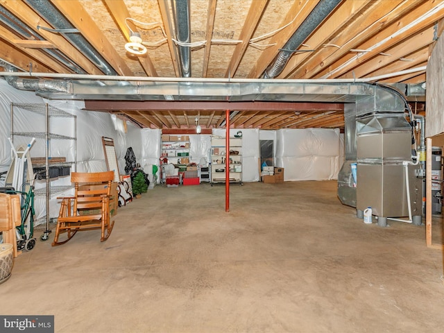 basement featuring heating unit