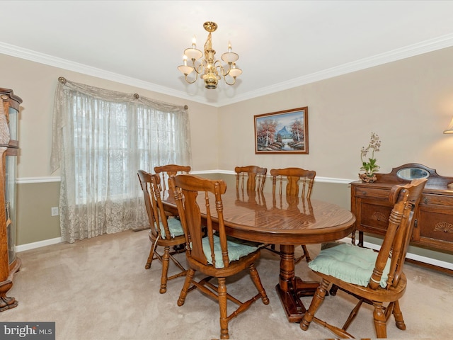 carpeted dining space with crown molding and a chandelier