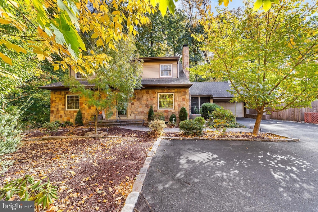 view of front of property with a garage