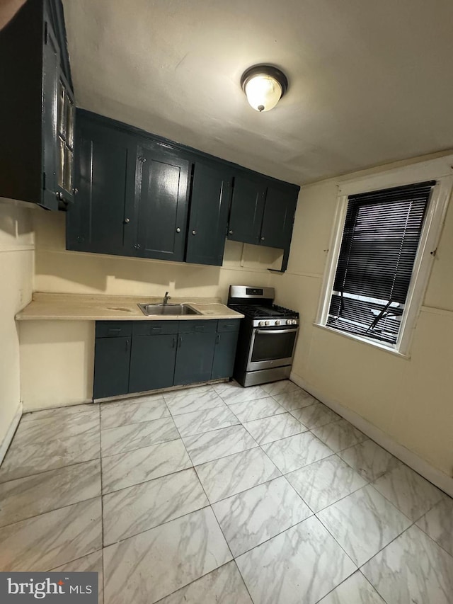 kitchen featuring sink and stainless steel gas range