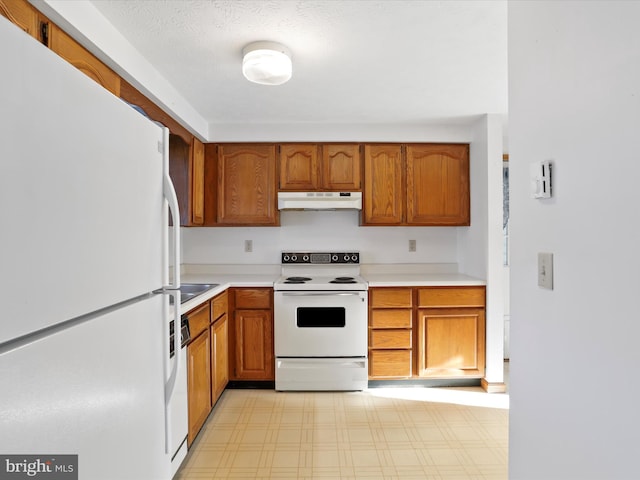 kitchen with white appliances