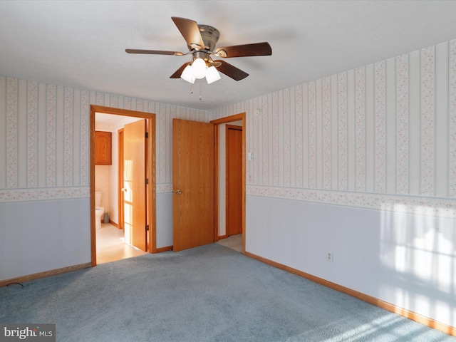 empty room featuring light colored carpet