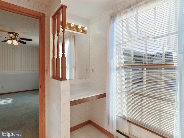 bathroom featuring ceiling fan