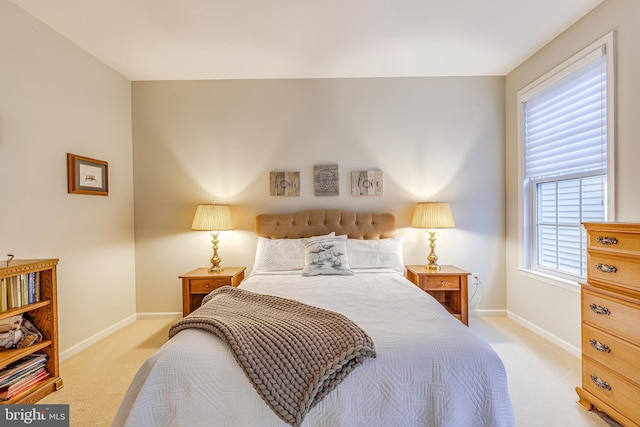 bedroom with light carpet