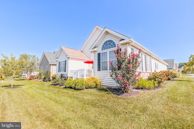 exterior space with a yard