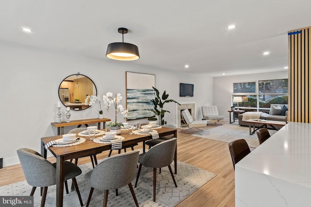 dining area with light hardwood / wood-style flooring