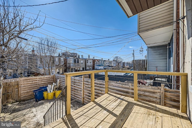 wooden deck featuring fence