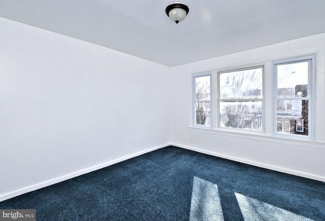 spare room with carpet flooring