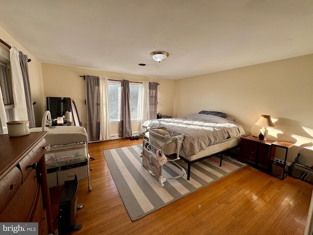 bedroom featuring hardwood / wood-style flooring