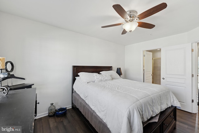 bedroom featuring dark hardwood / wood-style flooring and ceiling fan