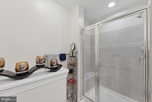 bathroom featuring an enclosed shower