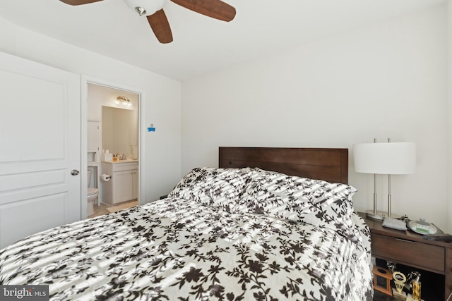 bedroom featuring ensuite bathroom and ceiling fan