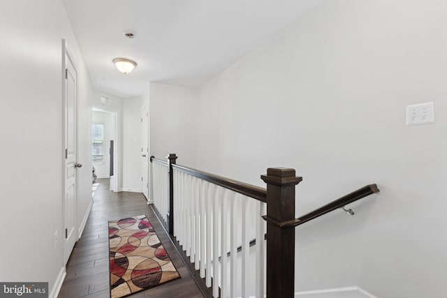 hallway featuring dark hardwood / wood-style flooring