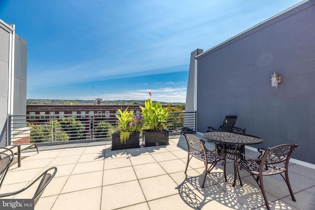 view of patio with a balcony