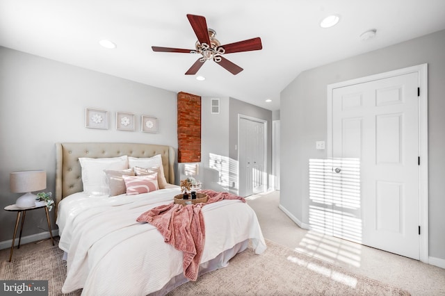 bedroom with baseboards, visible vents, carpet, a closet, and recessed lighting