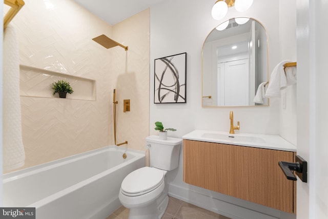 full bathroom featuring tile patterned flooring, vanity, toilet, and tiled shower / bath combo