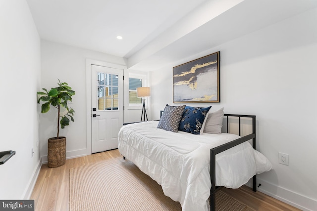 bedroom featuring hardwood / wood-style floors