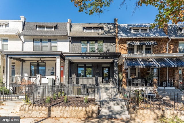 multi unit property featuring a porch