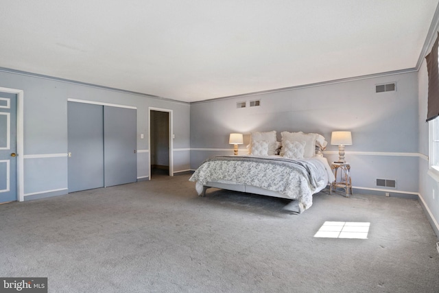 bedroom featuring carpet and ornamental molding