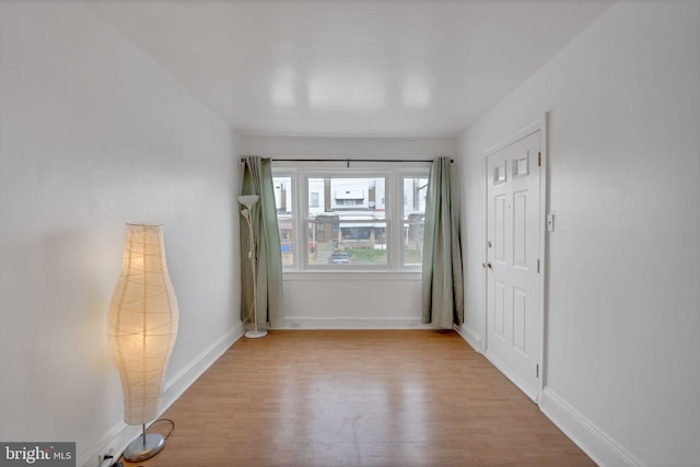 spare room featuring light hardwood / wood-style flooring