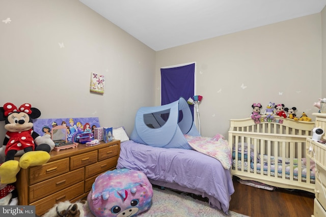 bedroom featuring hardwood / wood-style floors